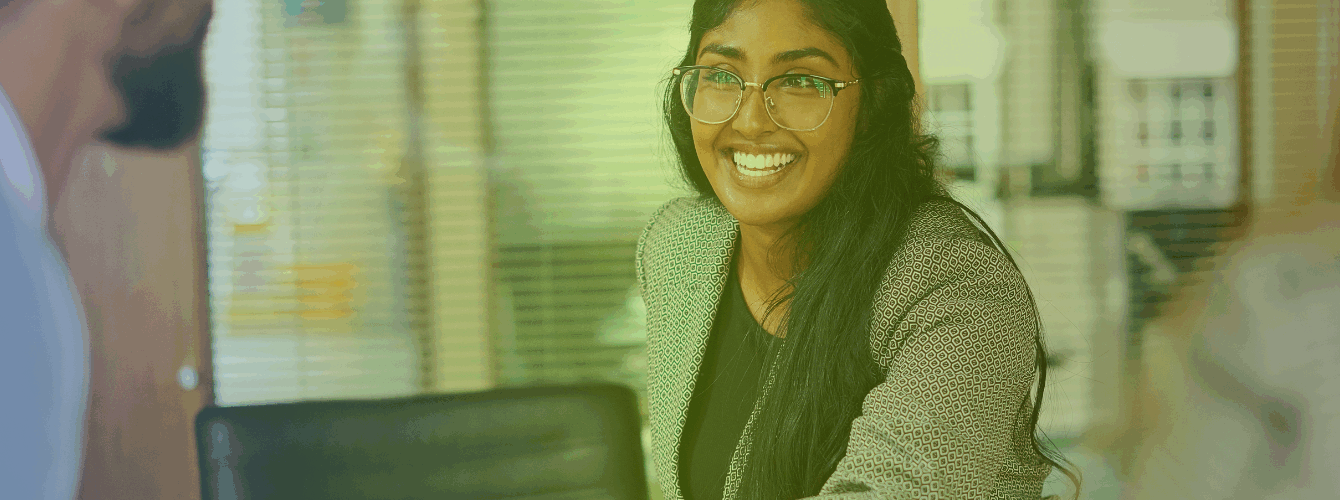 Illustration representing hidden interview biases with diverse candidates and interviewer